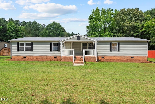 558 Christys Way, Roxboro, NC 27574 - view of front of home featuring crawl space, covered porch, a storage unit, and a front lawn