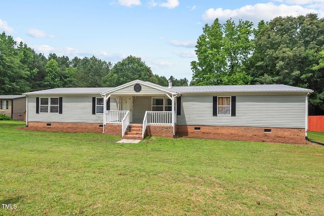558 Christys Way, Roxboro, NC 27574 - manufactured / mobile home with crawl space, a porch, a front lawn, and a metal roof