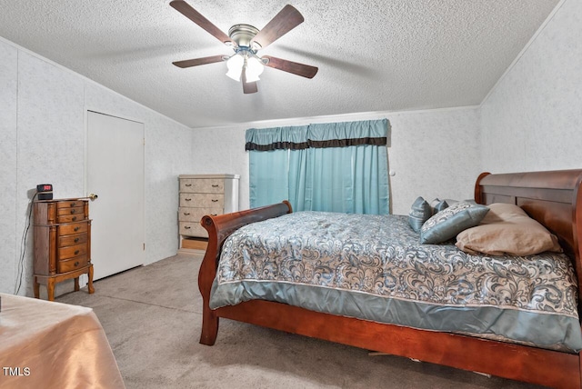 558 Christys Way, Roxboro, NC 27574 - bedroom featuring carpet, a textured ceiling, lofted ceiling, and a ceiling fan