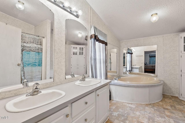 558 Christys Way, Roxboro, NC 27574 - bathroom featuring a textured ceiling, a bath, double vanity, stone finish floors, and curtained shower