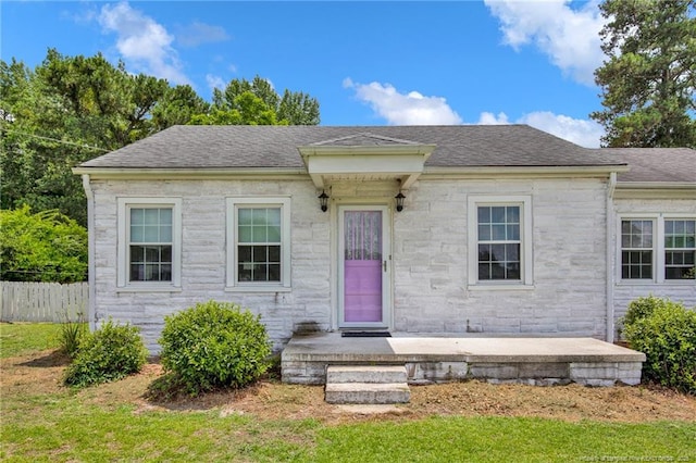 92 Nathan Dudley Rd, Clinton, NC 28328 - view of front facade featuring stone siding and roof with shingles