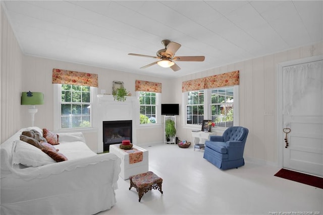 92 Nathan Dudley Rd, Clinton, NC 28328 - living area featuring a glass covered fireplace and ceiling fan