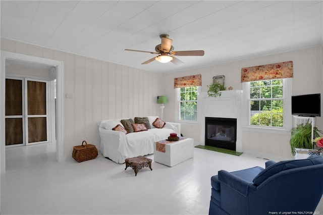 92 Nathan Dudley Rd, Clinton, NC 28328 - living room featuring plenty of natural light, ceiling fan, and a glass covered fireplace