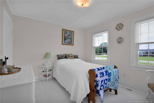 92 Nathan Dudley Rd, Clinton, NC 28328 - bedroom with baseboards and ornamental molding