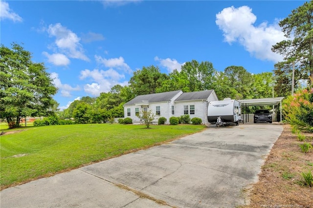 92 Nathan Dudley Rd, Clinton, NC 28328 - view of front of home featuring driveway, a carport, a front lawn, and view of wooded area