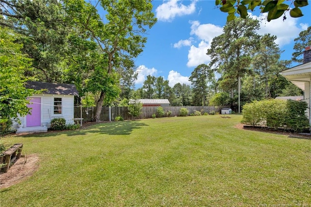 92 Nathan Dudley Rd, Clinton, NC 28328 - fenced backyard featuring a storage unit