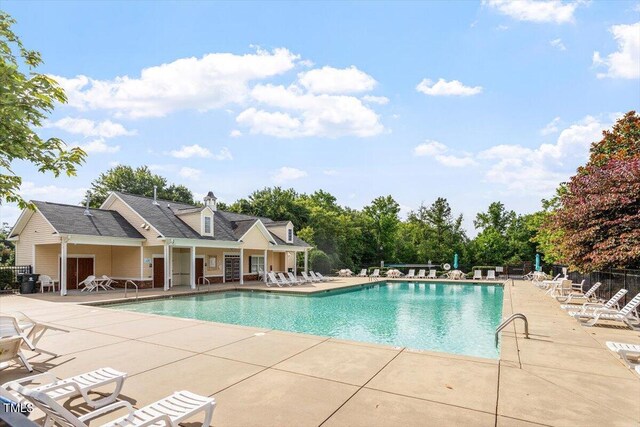 6001 Winged Willet Ct, Wendell, NC 27591 - community pool with a patio area