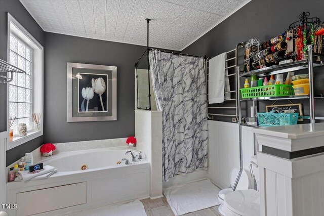 6001 Winged Willet Ct, Wendell, NC 27591 - bathroom featuring a whirlpool tub, curtained shower, an ornate ceiling, and marble finish flooring