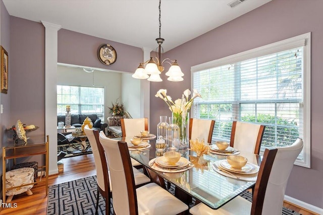 6001 Winged Willet Ct, Wendell, NC 27591 - dining area featuring wood finished floors and a chandelier
