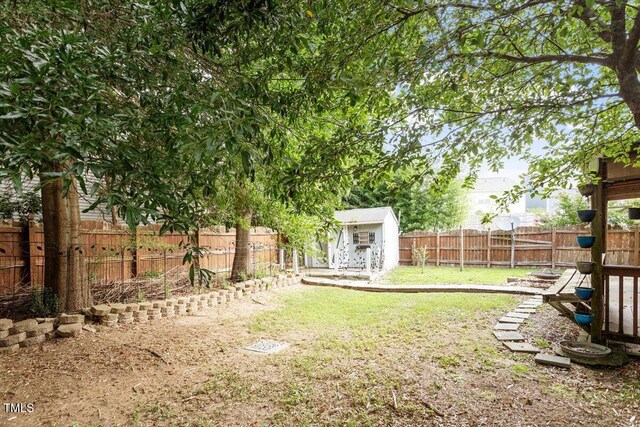 6001 Winged Willet Ct, Wendell, NC 27591 - fenced backyard featuring a shed