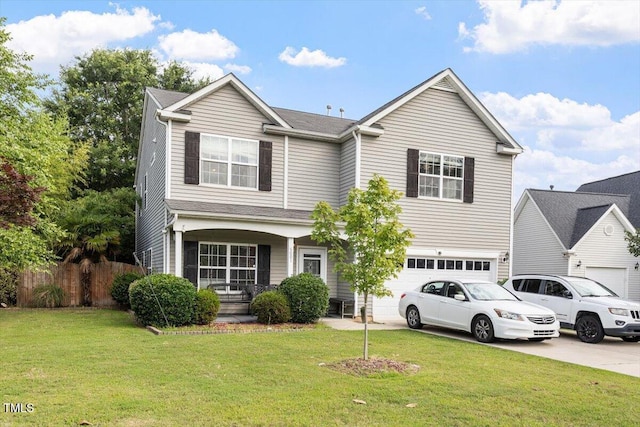 6001 Winged Willet Ct, Wendell, NC 27591 - view of front of property featuring driveway, a garage, and covered porch