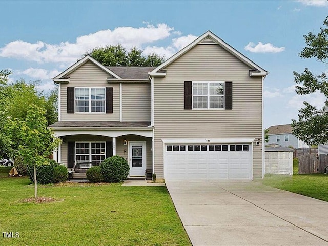 6001 Winged Willet Ct, Wendell, NC 27591 - traditional home featuring a garage, covered porch, concrete driveway, and a front lawn