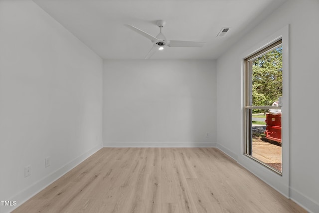 620 Red Carriage Ave, Durham, NC 27704 - spare room with light wood finished floors and a ceiling fan