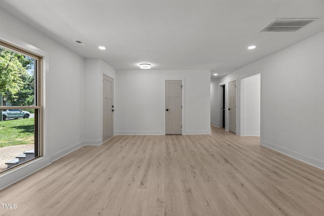 620 Red Carriage Ave, Durham, NC 27704 - unfurnished room featuring light wood-style floors and recessed lighting