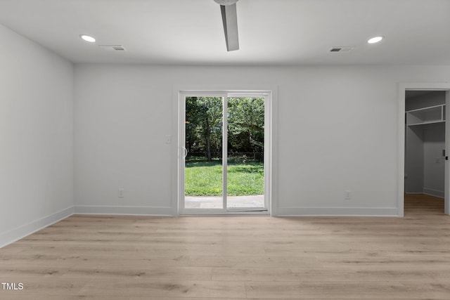 620 Red Carriage Ave, Durham, NC 27704 - unfurnished room with light wood-type flooring and recessed lighting