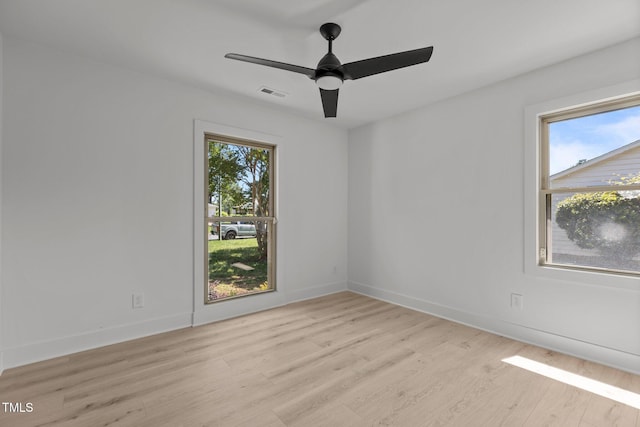 620 Red Carriage Ave, Durham, NC 27704 - empty room featuring light wood-style flooring and a ceiling fan