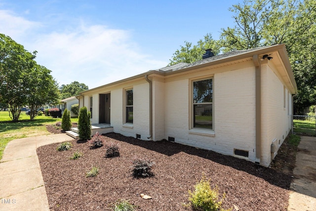 620 Red Carriage Ave, Durham, NC 27704 - view of front facade featuring crawl space, brick siding, and a shingled roof