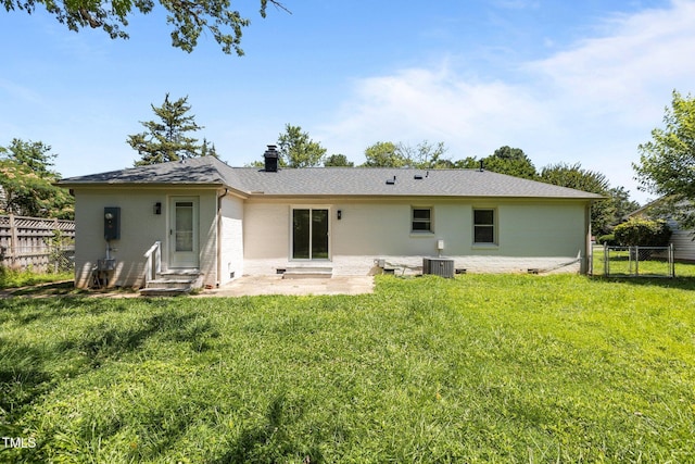 620 Red Carriage Ave, Durham, NC 27704 - rear view of property featuring entry steps, brick siding, a chimney, a shingled roof, and a gate