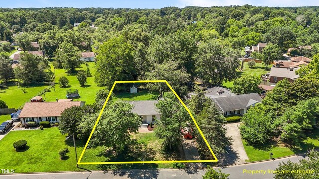 620 Red Carriage Ave, Durham, NC 27704 - aerial view of residential area with property parcel outlined and a forest