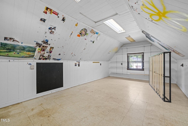 3516 Swift Dr, Raleigh, NC 27606 - additional living space featuring lofted ceiling, light flooring, and wood walls