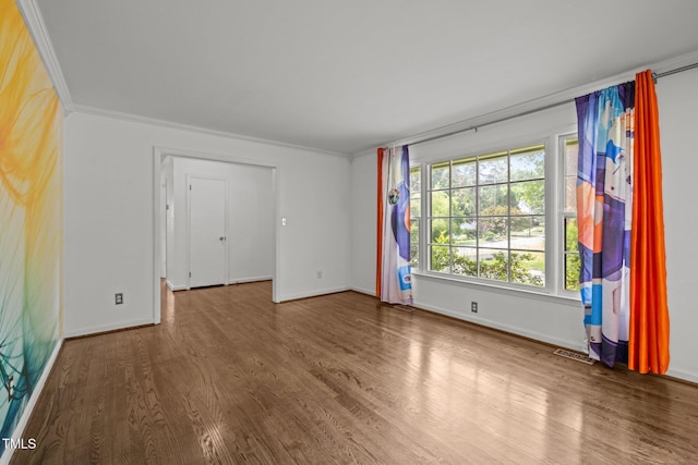 3516 Swift Dr, Raleigh, NC 27606 - unfurnished room featuring wood finished floors and crown molding