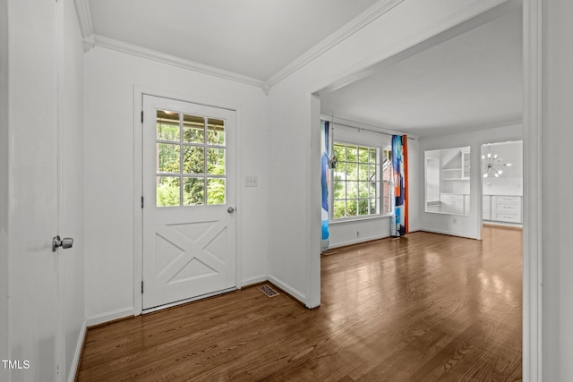 3516 Swift Dr, Raleigh, NC 27606 - doorway featuring wood finished floors and crown molding