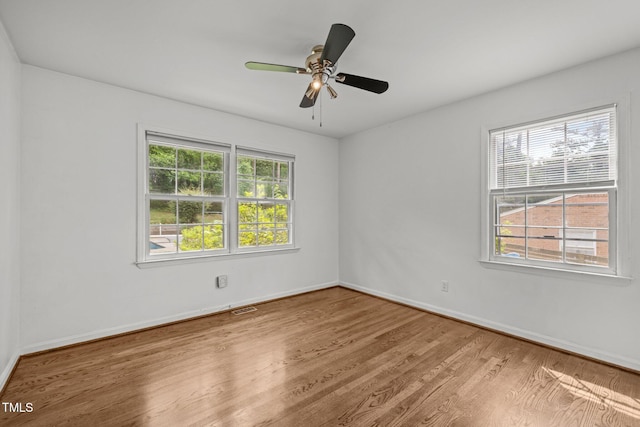 3516 Swift Dr, Raleigh, NC 27606 - spare room with wood finished floors and ceiling fan