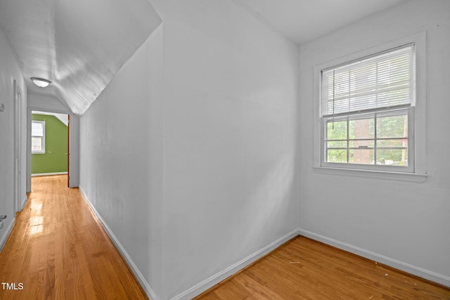 3516 Swift Dr, Raleigh, NC 27606 - hallway with light wood finished floors and vaulted ceiling