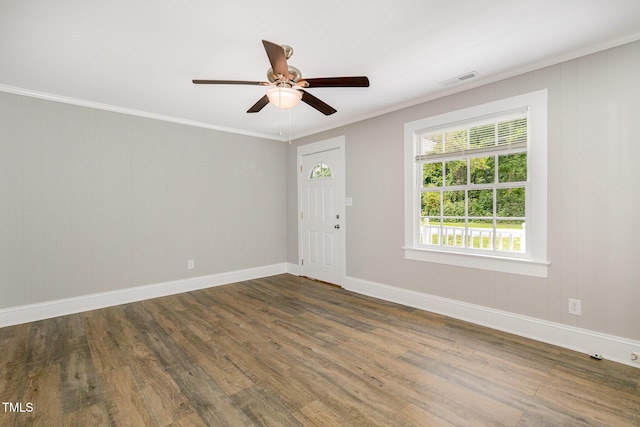 603 S Third St, Mebane, NC 27302 - spare room with wood finished floors, crown molding, and a ceiling fan