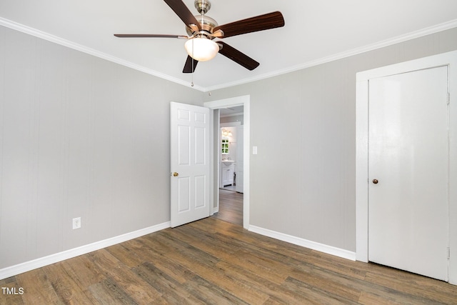 603 S Third St, Mebane, NC 27302 - unfurnished bedroom featuring wood finished floors, crown molding, and ceiling fan