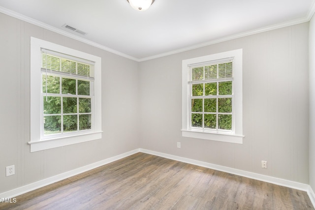 603 S Third St, Mebane, NC 27302 - unfurnished room featuring wood finished floors and ornamental molding