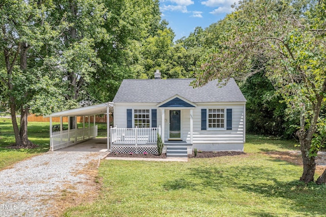 603 S Third St, Mebane, NC 27302 - view of front of property featuring driveway, a front lawn, covered porch, and a shingled roof