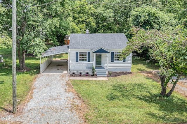 603 S Third St, Mebane, NC 27302 - view of front of property with roof with shingles, driveway, and a front lawn