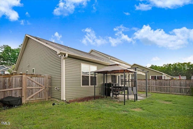51 Balboa Pkwy, Clayton, NC 27520 - back of house featuring a gazebo, a fenced backyard, and a gate