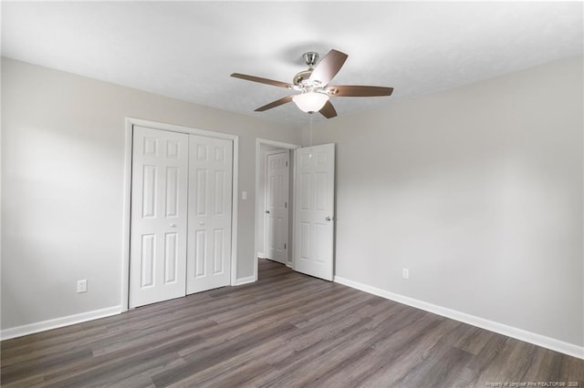 329 W Railroad St, Parkton, NC 28371 - unfurnished bedroom with a closet, wood finished floors, and ceiling fan