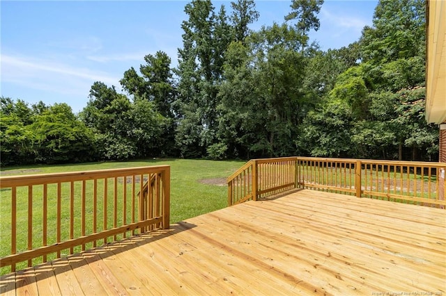 329 W Railroad St, Parkton, NC 28371 - wooden deck featuring a lawn