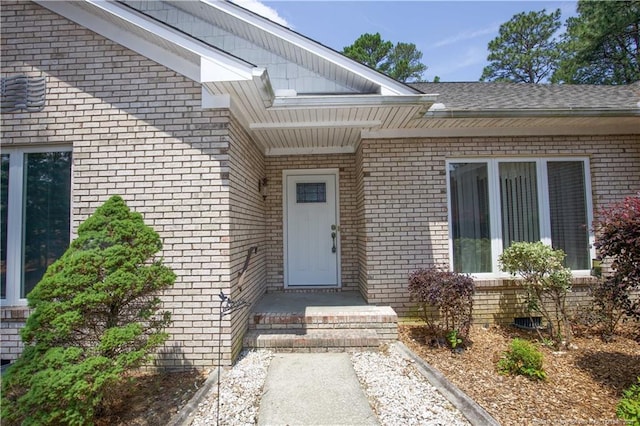 38 Windsong Pl, Whispering Pines, NC 28327 - property entrance featuring brick siding
