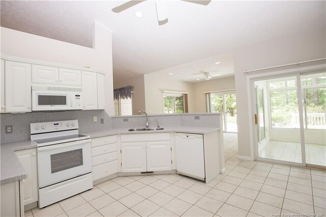 38 Windsong Pl, Whispering Pines, NC 28327 - kitchen featuring white appliances, a ceiling fan, light countertops, a peninsula, and recessed lighting