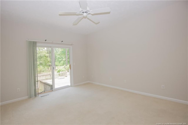 38 Windsong Pl, Whispering Pines, NC 28327 - unfurnished room with light carpet and a ceiling fan