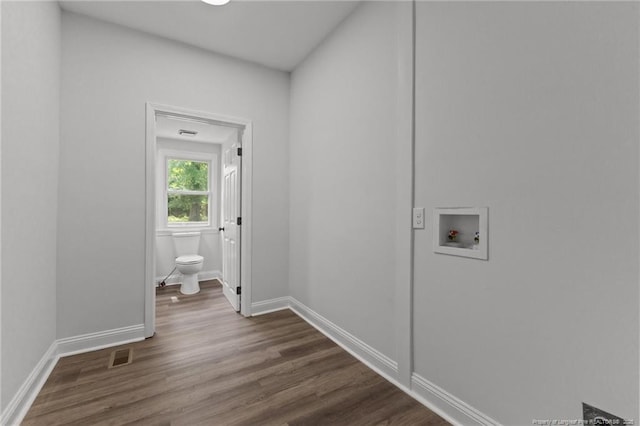 123 John St, Fayetteville, NC 28305 - laundry room featuring washer hookup and dark wood-type flooring