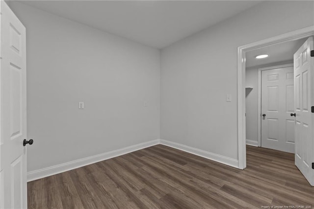 123 John St, Fayetteville, NC 28305 - empty room featuring dark wood-type flooring and baseboards