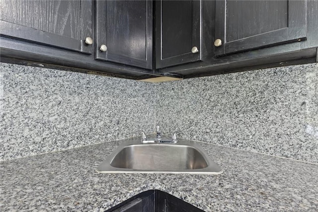 123 John St, Fayetteville, NC 28305 - kitchen view of a sink and tasteful backsplash