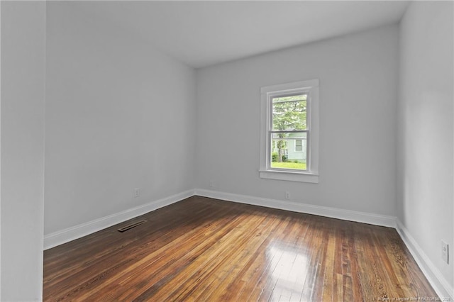 123 John St, Fayetteville, NC 28305 - empty room featuring hardwood / wood-style flooring and baseboards