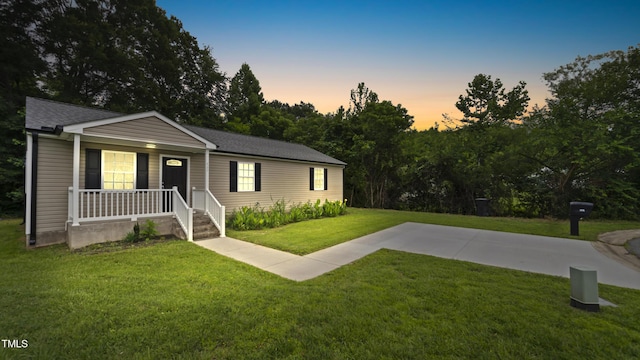 427 Elm Ct, Burlington, NC 27217 - view of front of property featuring a porch and a yard