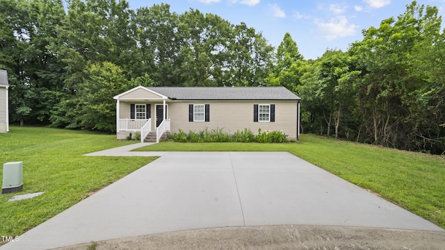 427 Elm Ct, Burlington, NC 27217 - view of front of house featuring a porch, a front lawn, and a shingled roof