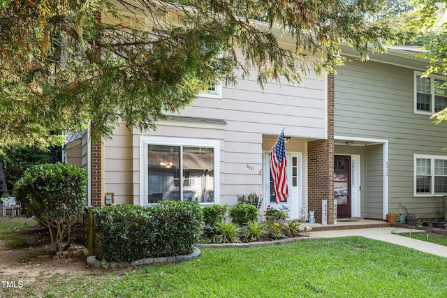 6021 Dixon Dr, Raleigh, NC 27609 - multi unit property featuring a front yard