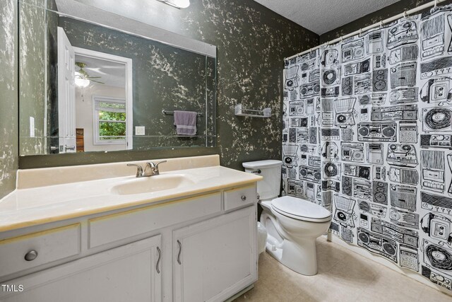 6021 Dixon Dr, Raleigh, NC 27609 - full bathroom with wallpapered walls, vanity, a shower with shower curtain, a ceiling fan, and a textured ceiling