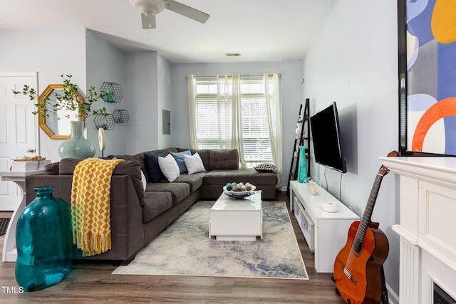 320 Gilman Ln Unit 106, Raleigh, NC 27610 - living area featuring wood finished floors and ceiling fan