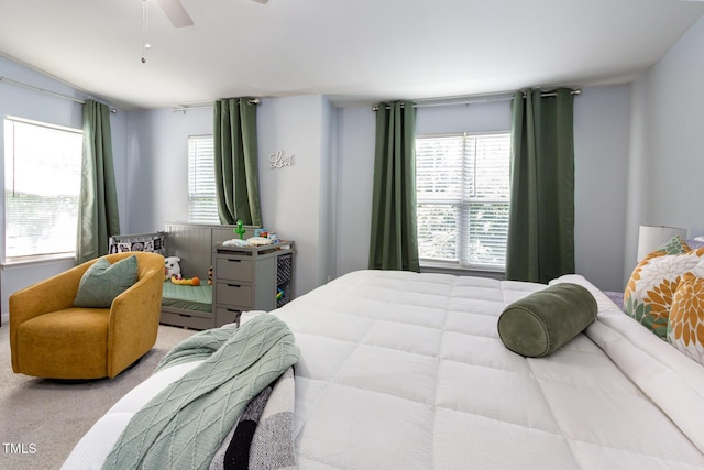320 Gilman Ln Unit 106, Raleigh, NC 27610 - bedroom with multiple windows, carpet flooring, and ceiling fan