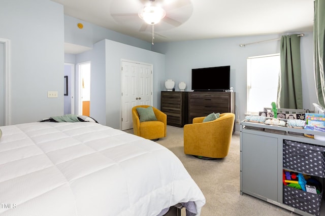 320 Gilman Ln Unit 106, Raleigh, NC 27610 - bedroom featuring light colored carpet, a ceiling fan, and a closet